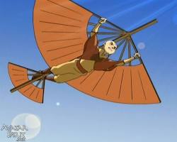 Image of Aang, the Avatar, soaring through the air on his glider